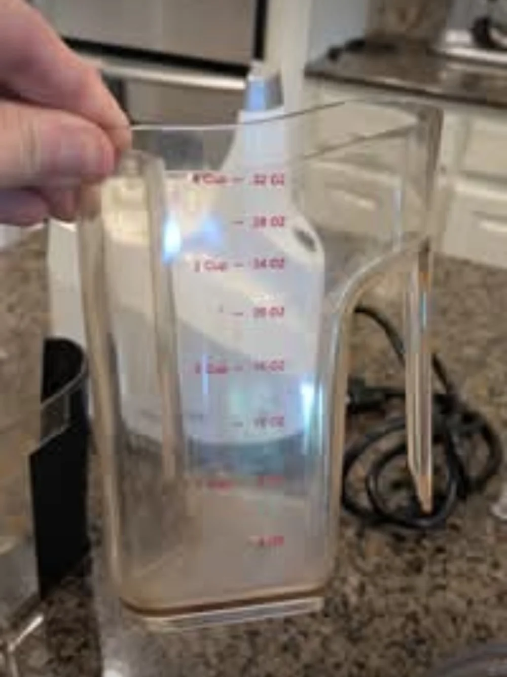 White Hurom Cold Press Juicer with Juicing Cookbooks